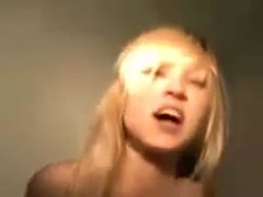A thin, golden-haired whore in a cowgirl pose while riding a firm shaft